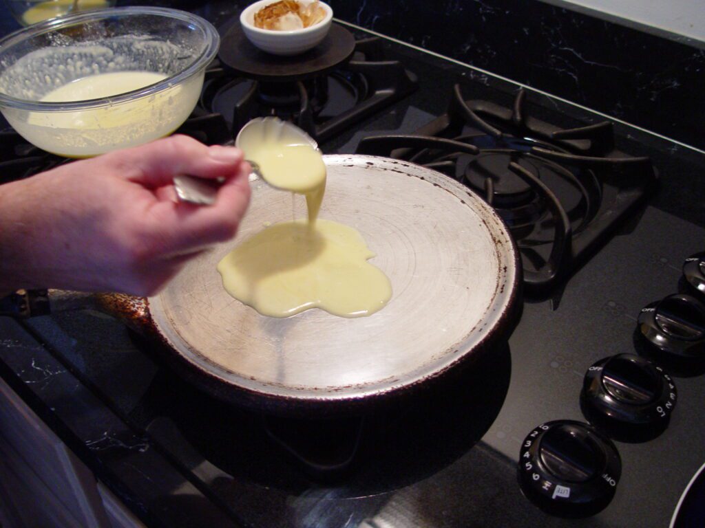 pouring pancake batter