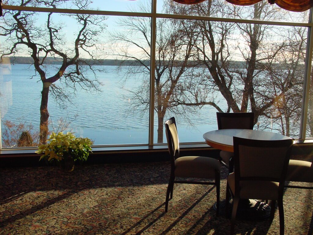view of green lake from lobby area